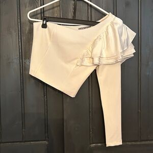 NEW. One shouldered top. South boutique.